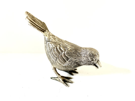 Sold - Metal silver tone bird figurine measuring 5-3/4"